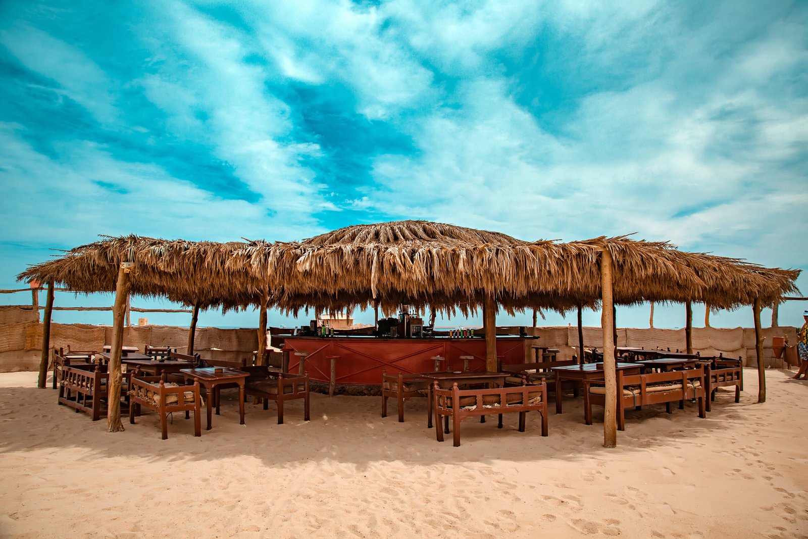 Soft white sand and calm turquoise water on Paradise Island Hurghada.''