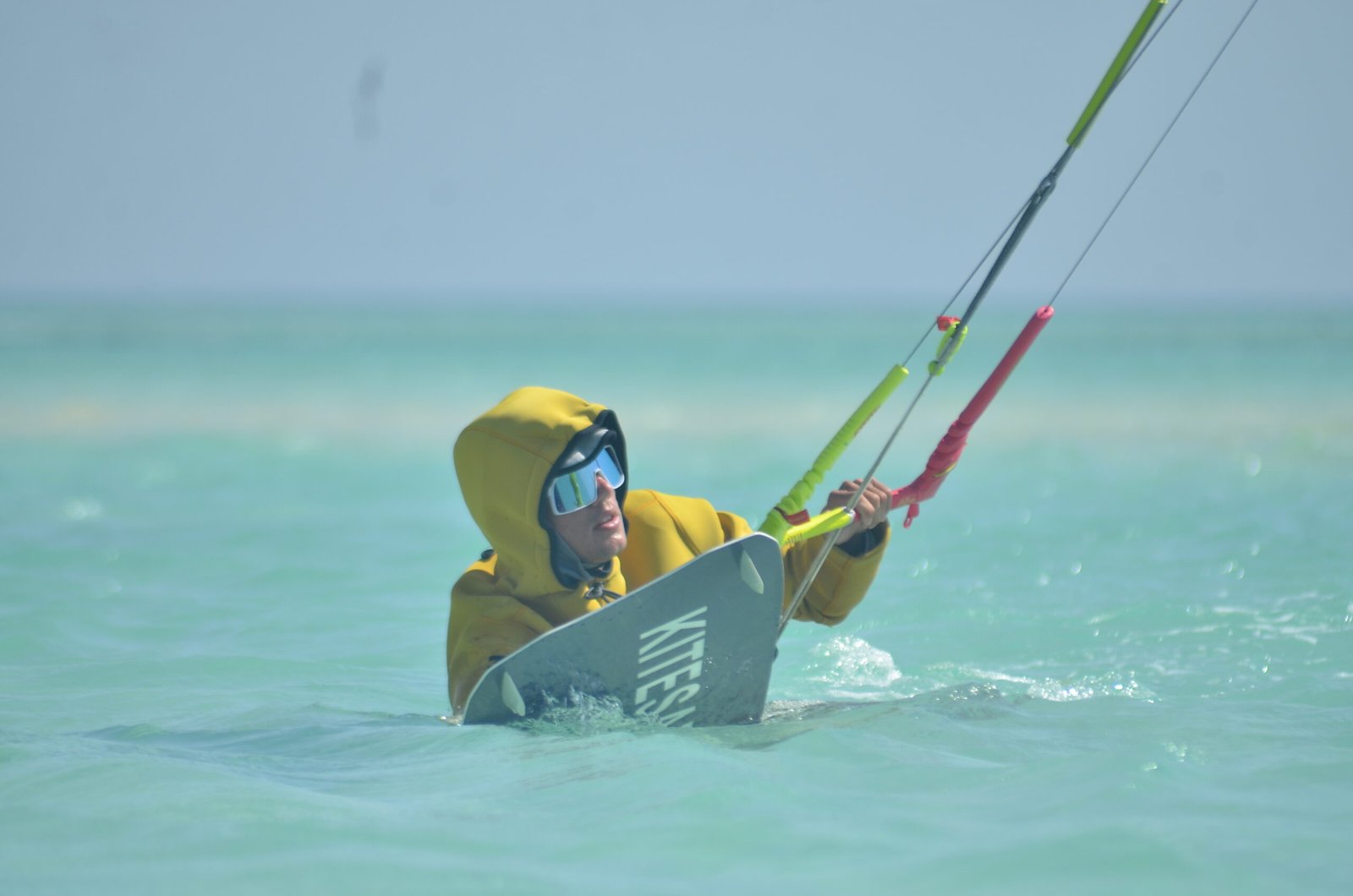 A first-time kite surfer learning balance and control in the shallow lagoon of Hurghada — one of Egypt’s best spots for beginners on the Red Sea.