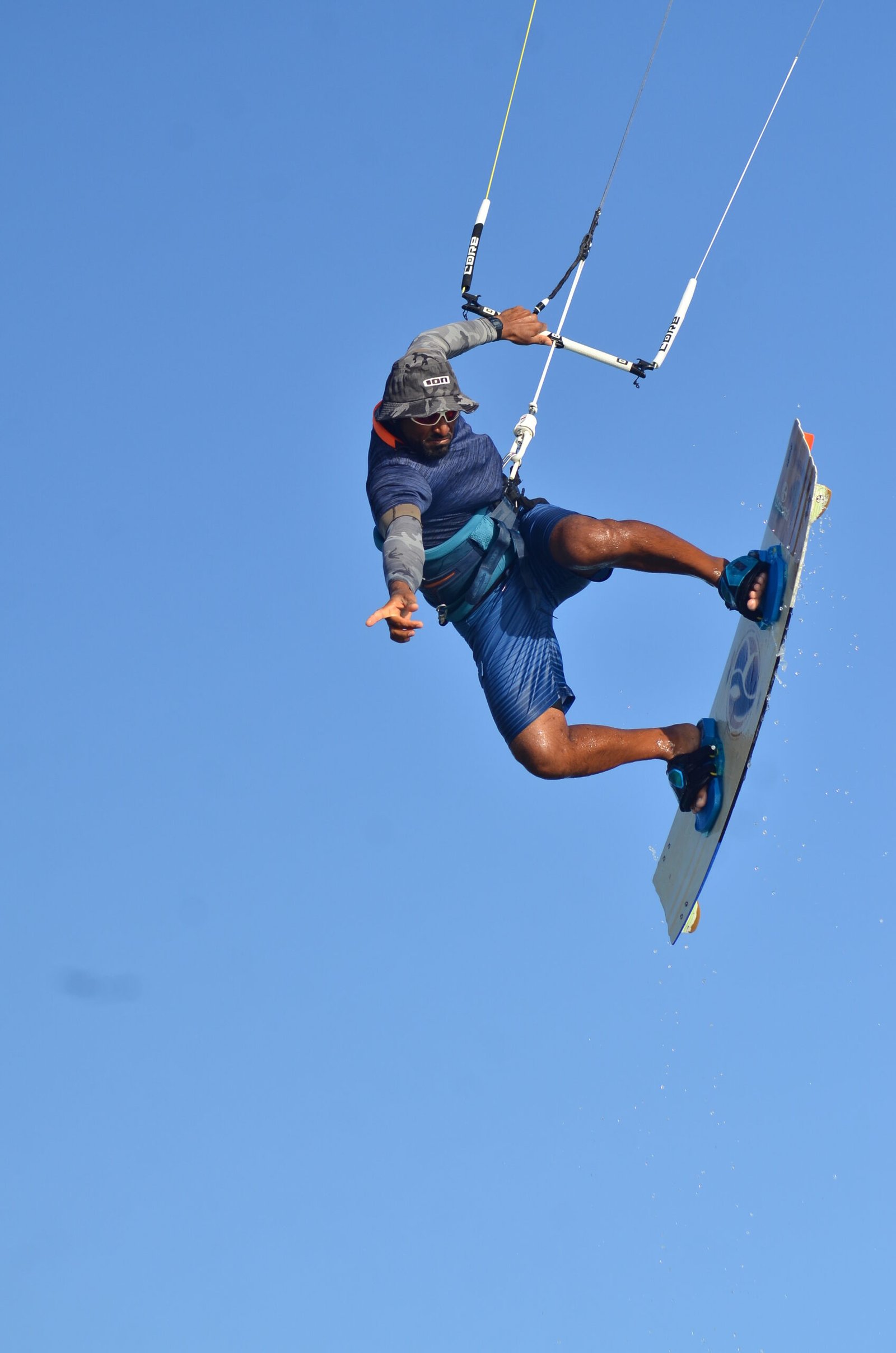 A vibrant scene at the Hurghada kite surfing school, where students and instructors enjoy perfect Red Sea wind conditions.