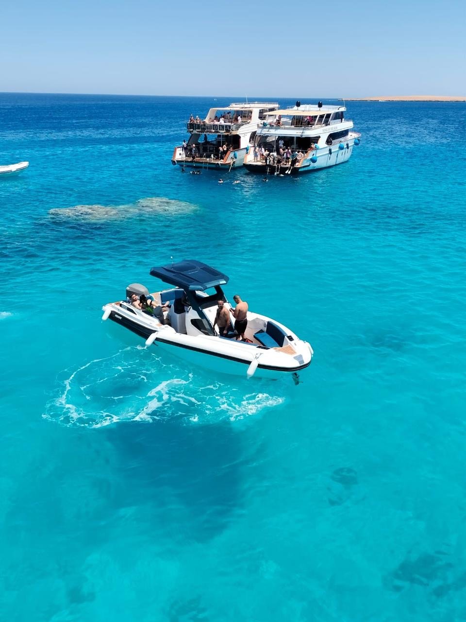 Beautiful white sand and turquoise water at Bayoud Island near Hurghada, perfect for swimming and relaxation.