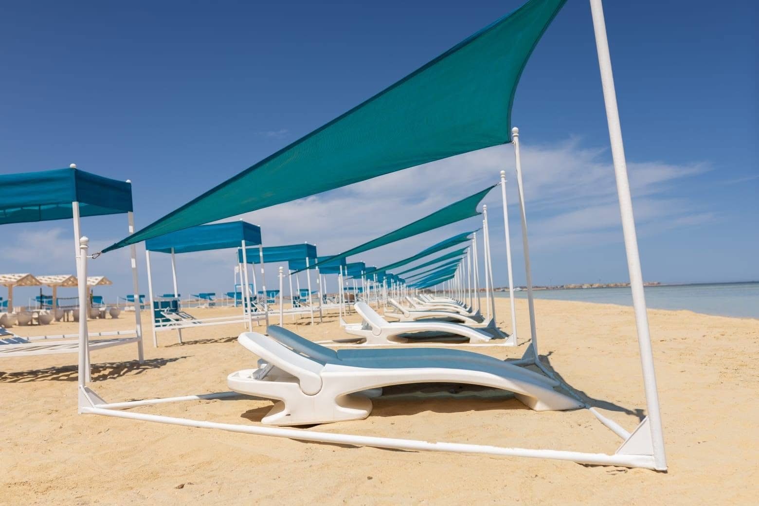 Guided snorkeling over colorful coral gardens at Biance Island Utopia Safaga..