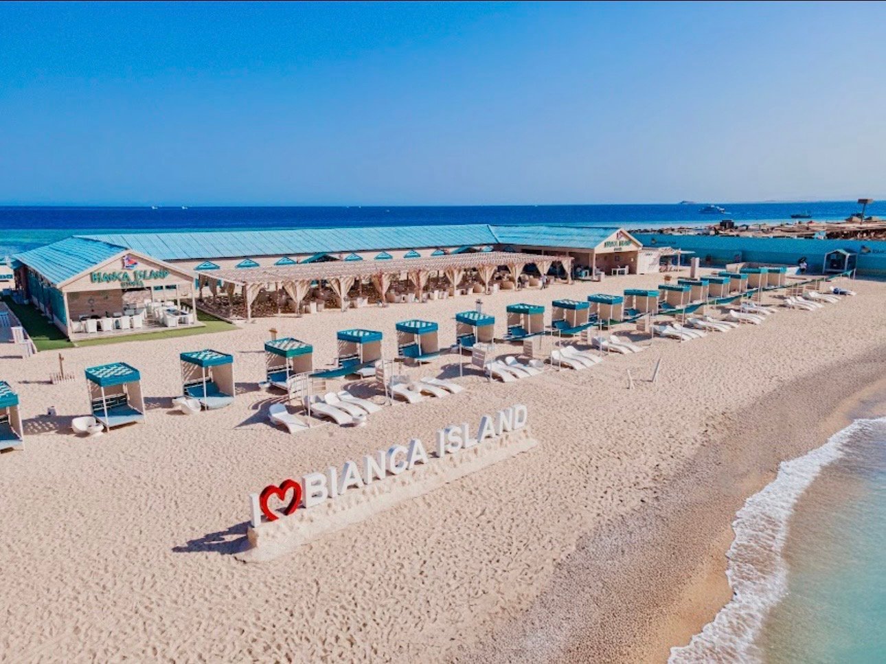 Guided snorkeling over colorful coral gardens at Biance Island Utopia Safaga...