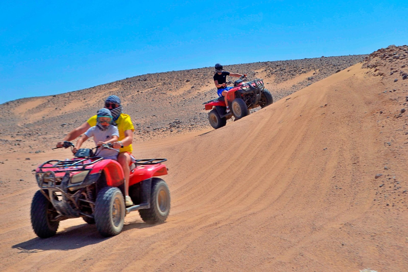 Desert Quad Safari Hurghada Sunset safety gear helmets vests..