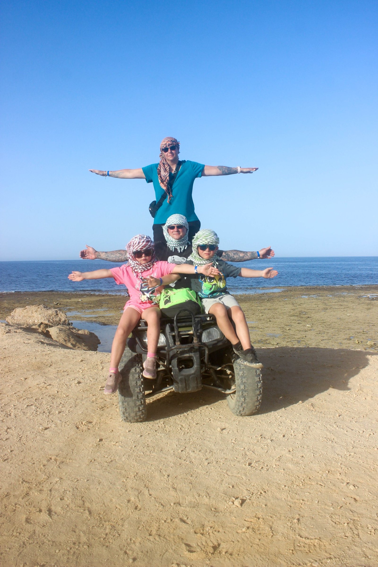 Chase the sun across golden dunes on the Desert Quad Safari Hurghada Sunset.''