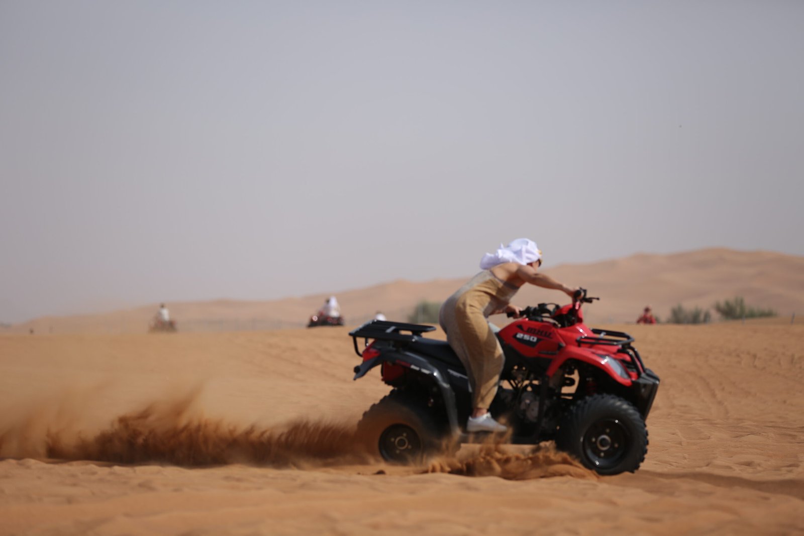 Chase the sun across golden dunes on the Desert Quad Safari Hurghada Sunset...