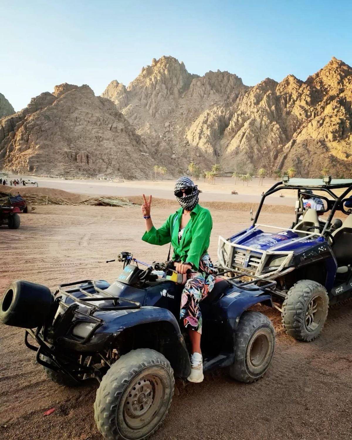 Chase the sun across golden dunes on the Desert Quad Safari Hurghada Sunset.