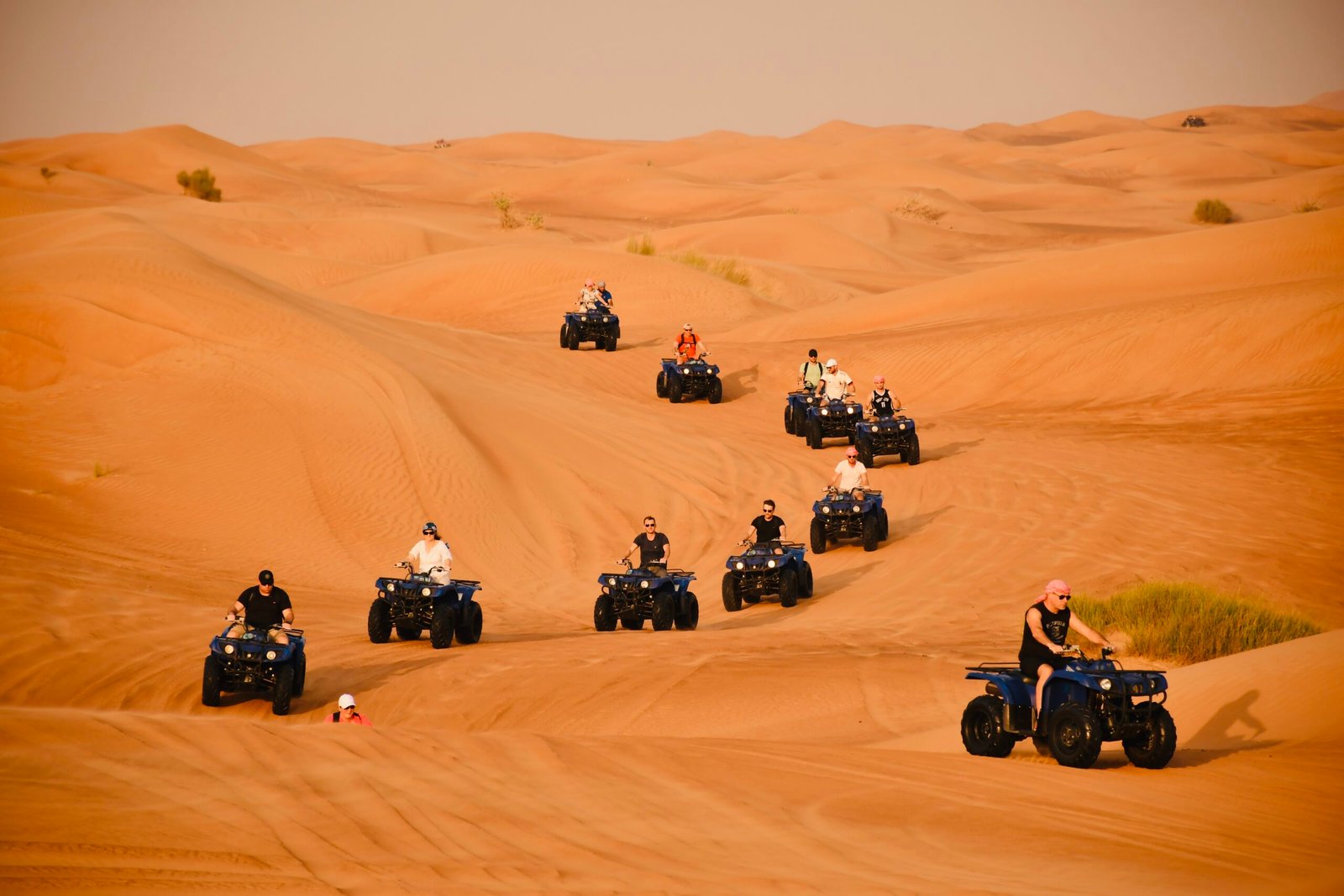Chase the sun across golden dunes on the Desert Quad Safari Hurghada Sunset....