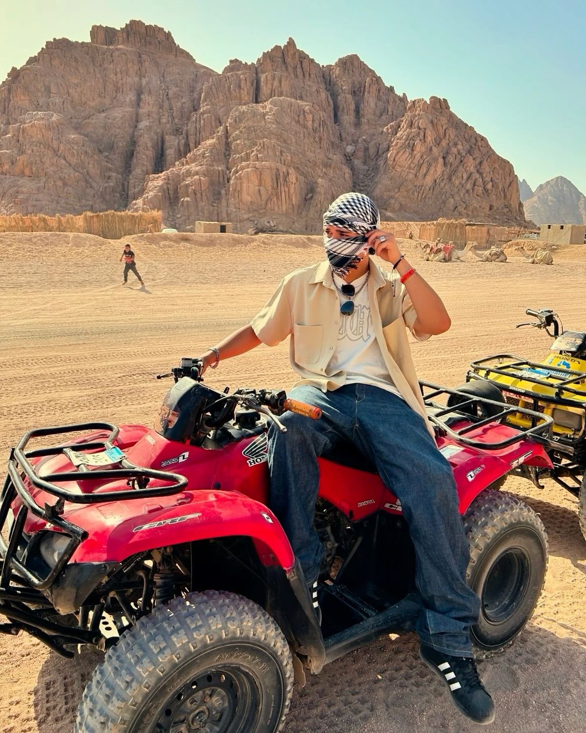 Chase the sun across golden dunes on the Desert Quad Safari Hurghada Sunset...