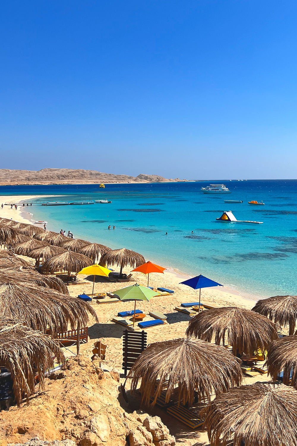 Snorkel above vibrant coral gardens on Mahmya Island Hurghada.