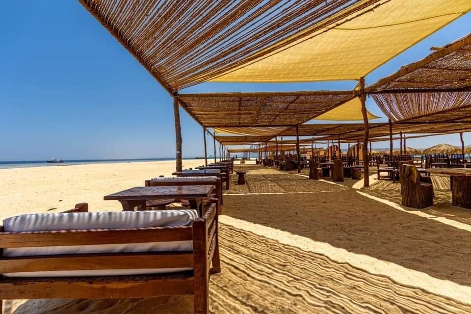 Powdery white sand and turquoise shallows on Utopia Island Safaga....