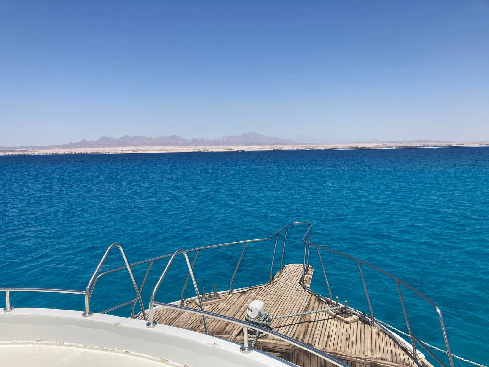 Powdery white sand and turquoise shallows on Utopia Island Safaga....