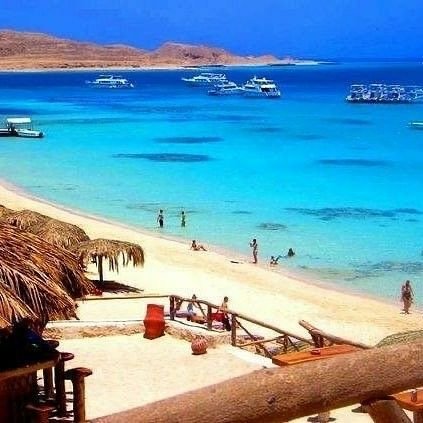 Orange Bay Hurghada white sand beach turquoise water 2026