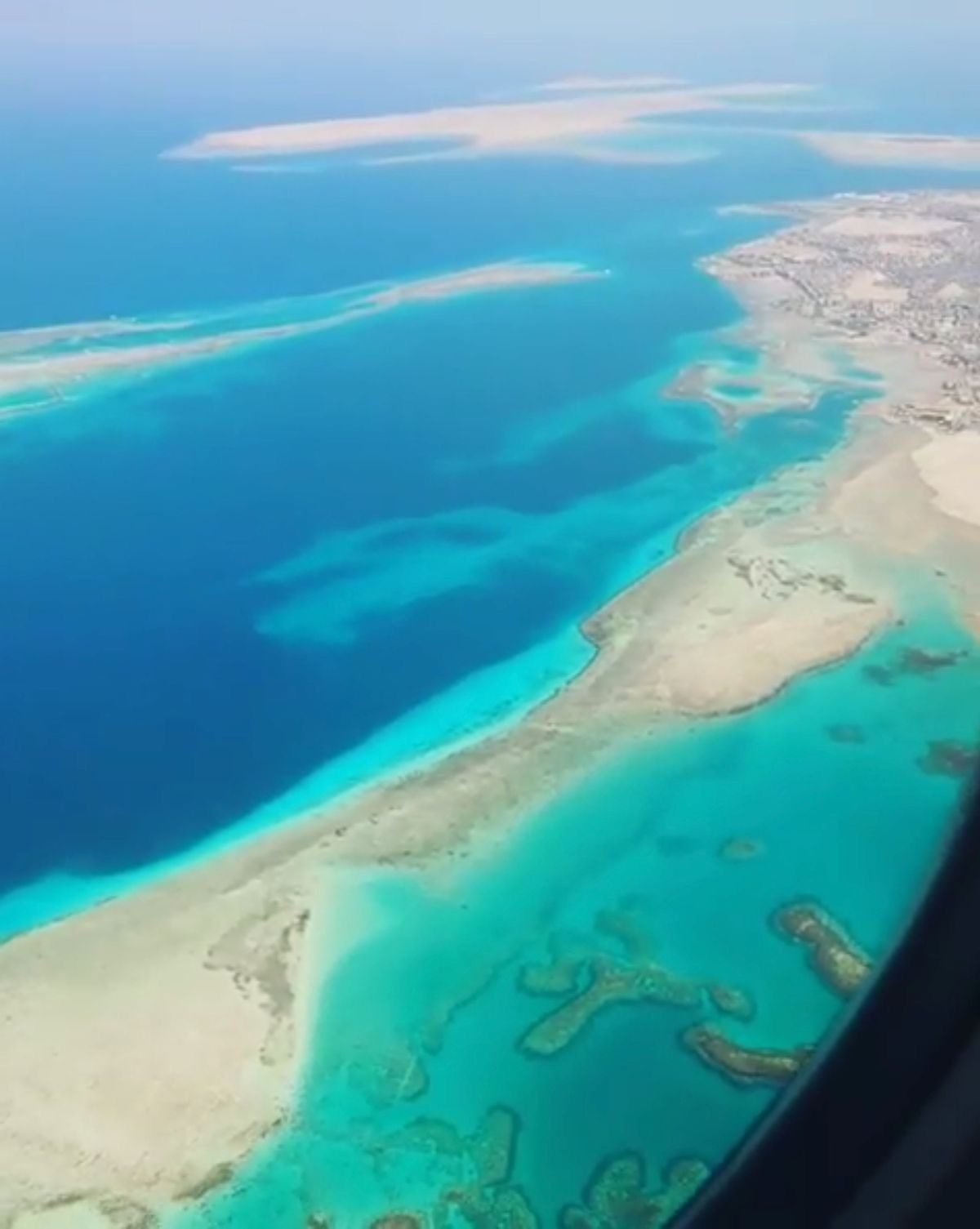 Tourist Diver Kicking Up Sand on Reef
